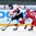 ZUG, SWITZERLAND - APRIL 23: Switzerland's Damien Riat #9 lets a shot go while Russia's Ivan Yemets #24 defends during quarterfinal round action at the 2015 IIHF Ice Hockey U18 World Championship. (Photo by Francois Laplante/HHOF-IIHF Images)